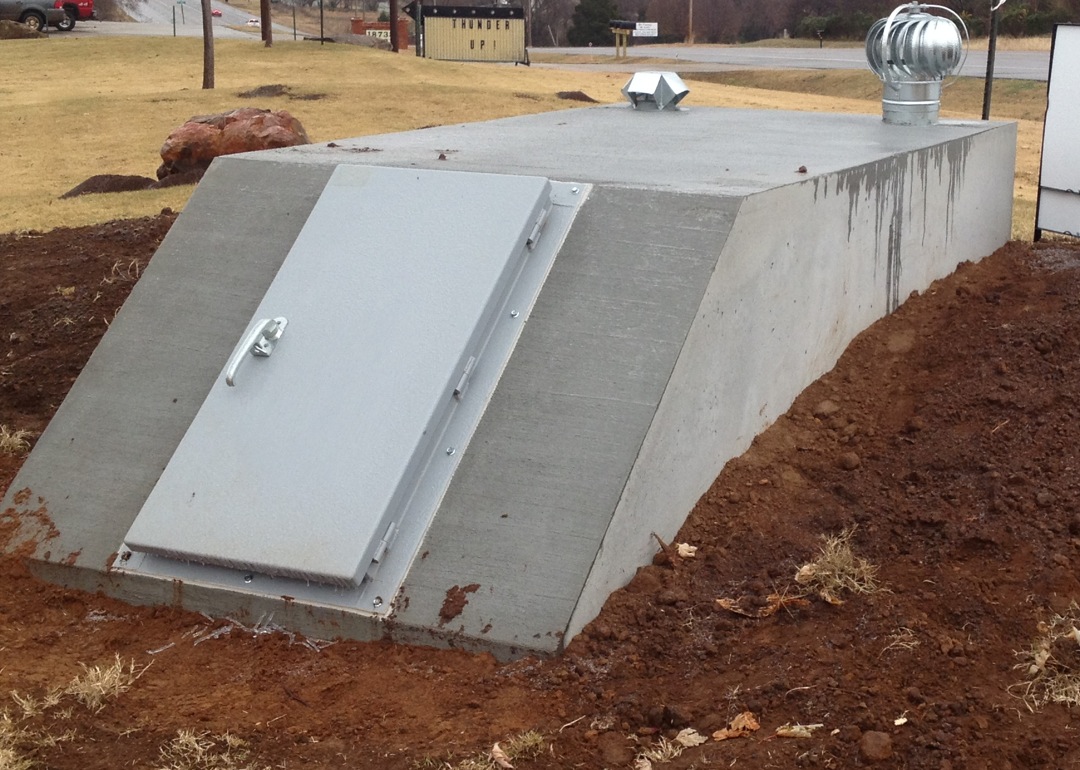 Underground concrete storm shelter installed on a North Central Texas property